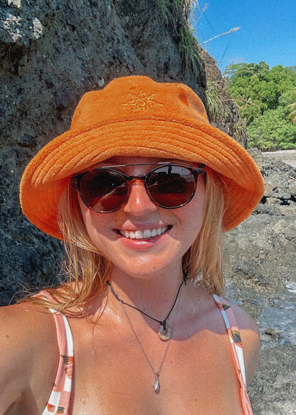 Chapeau bucket orangé tissu Terry